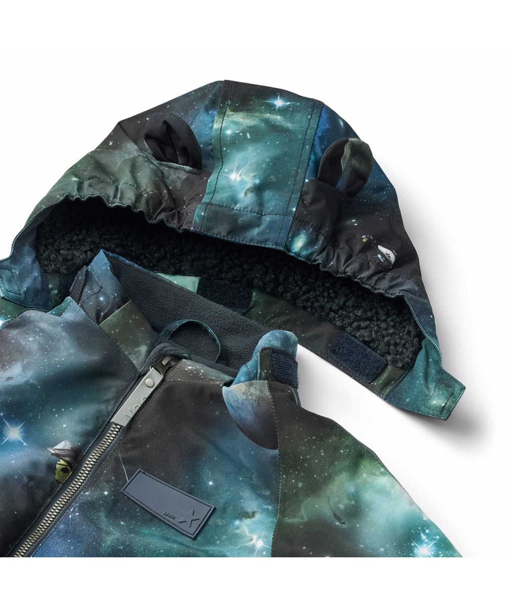 Hyde - Far Out - Water-repellent jumpsuit with space print for the little ones, made of recycled polyester.