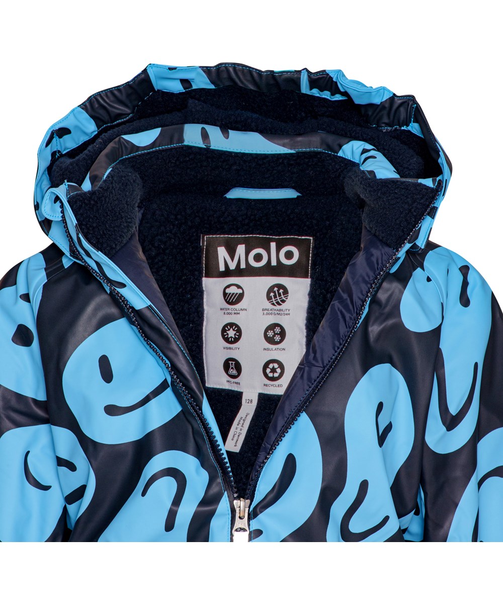 Paco - Smile On Blue - Unisex rubber snowsuit in blue with faces