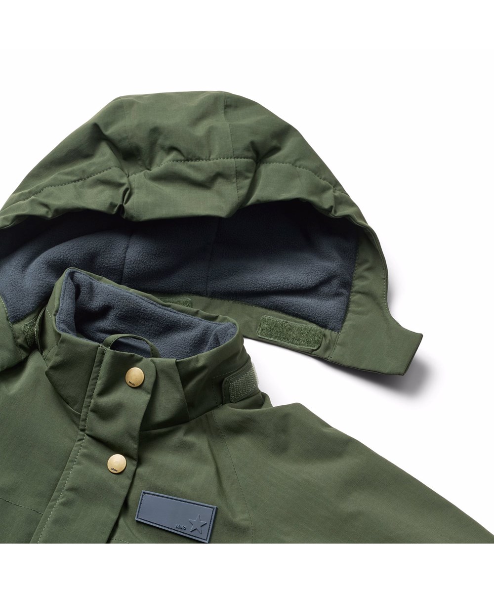 Pingo - Dark Forest - Water-repellent dark green jumpsuit, made of recycled nylon, suitable for temperatures down to -10°C.