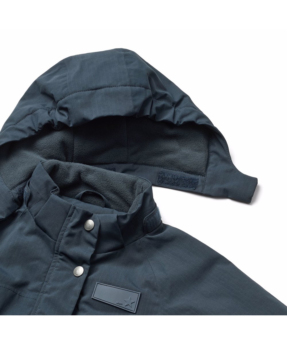 Pingo - Night Navy - Water-repellent dark blue jumpsuit, made of recycled nylon, suitable for temperatures down to -10°C.