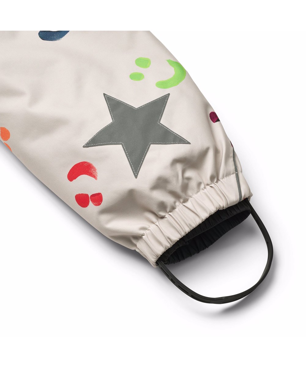 Polaris Fur - Arty Emotions - Wind and waterproof snowsuit with a print of colourful smiling faces for a cold winter or ski holiday in recycled polyester and padded with 3M™ Thinsulate™.