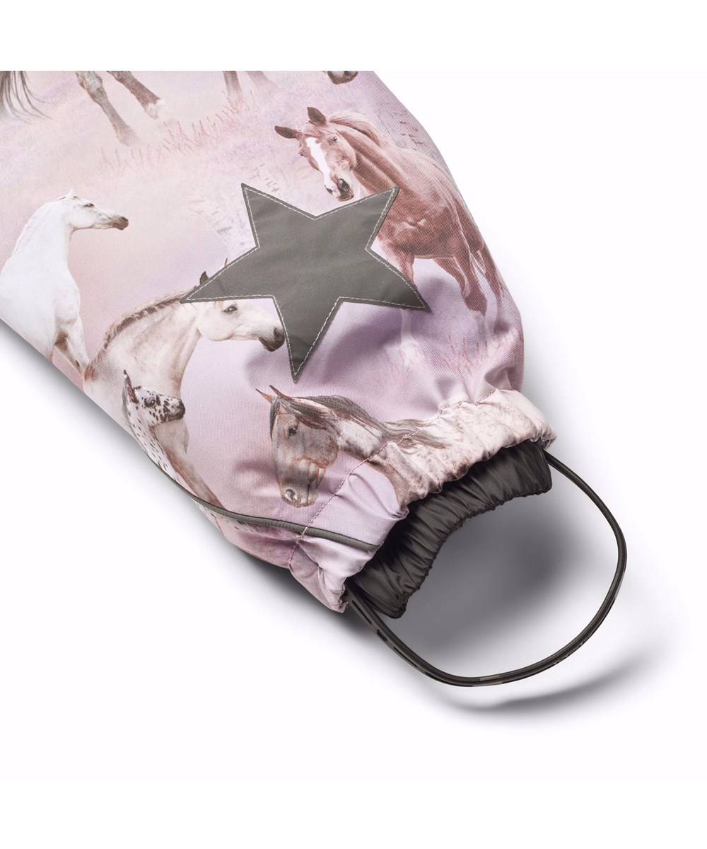 Polaris Fur - Dreamy Horses - Children's snowsuit in recycled polyester with a beautiful horse print in shades of pink and purple on a dreamy background.