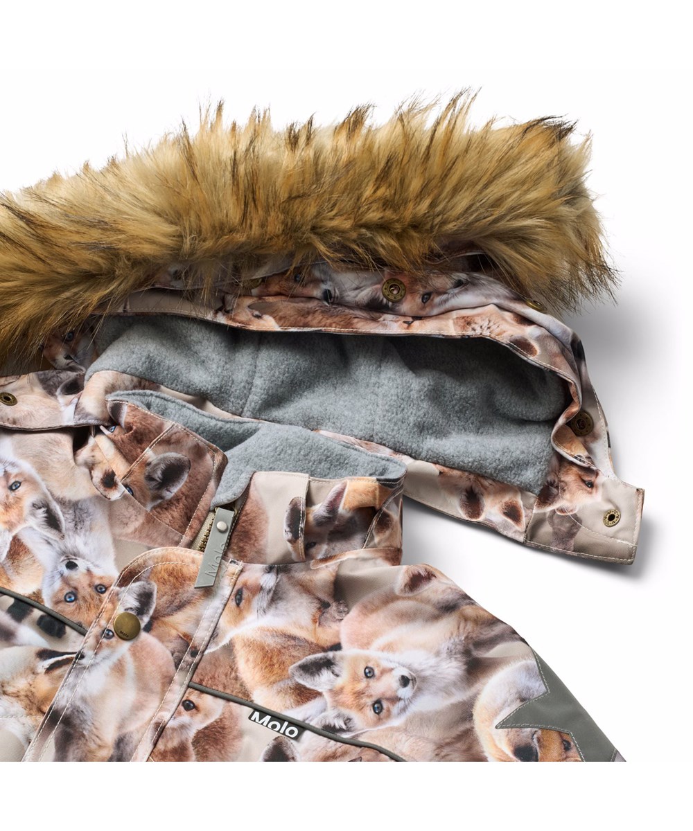 Polaris Fur - Playing Foxes - Wind and waterproof snowsuit with a print of fox cubs in brown shades for a cold winter or ski holiday in recycled polyester and padded with 3M™ Thinsulate™.