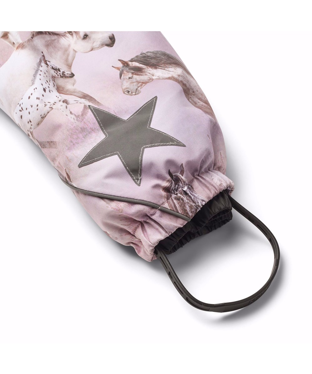 Pyxis Fur - Dreamy Horses - Children's snowsuit in recycled polyester with a print of horses in pink and purple shades.