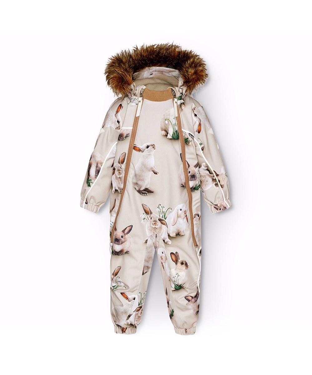 Pyxis Fur - Winter Rabbits - Children's snowsuit in recycled polyester with a print of cute rabbits among snowdrops on a grey background.