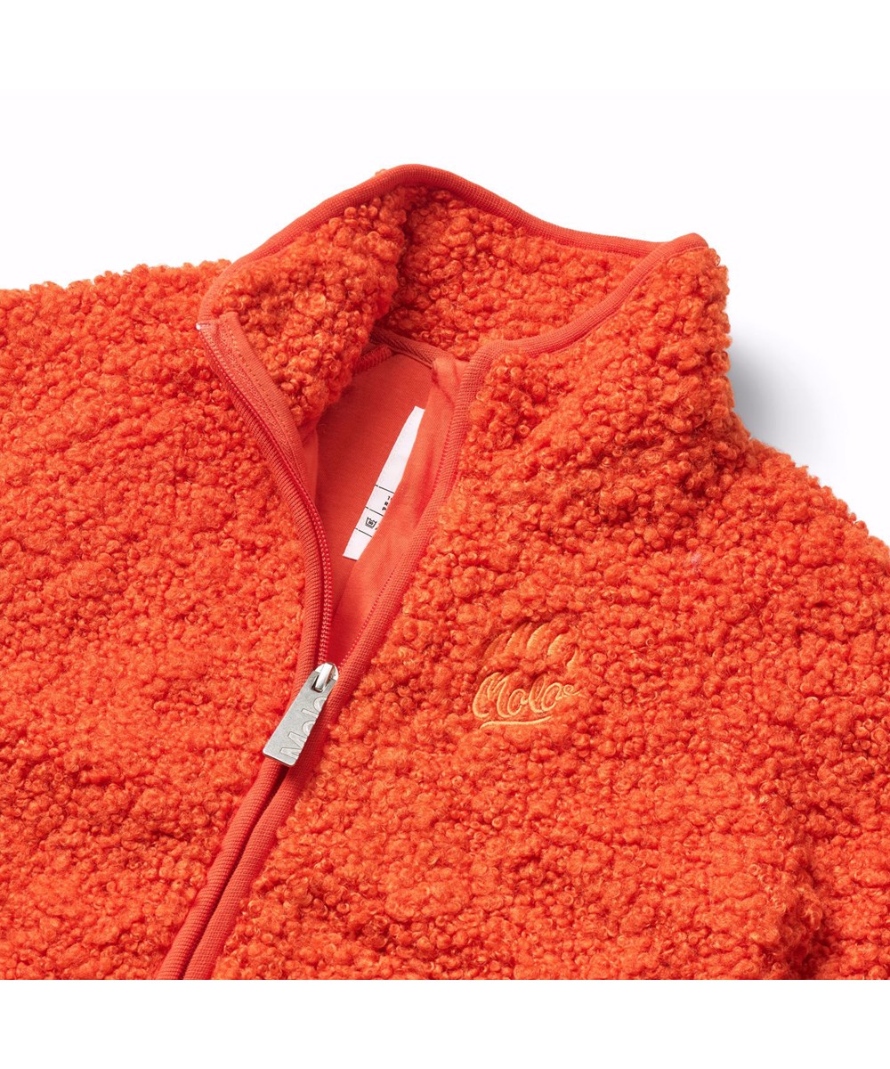 Ulan - Rising Sun - Orange fleecejakke til børn i genanvendt polyester med flot ryg patch i slidstærkt nylon.