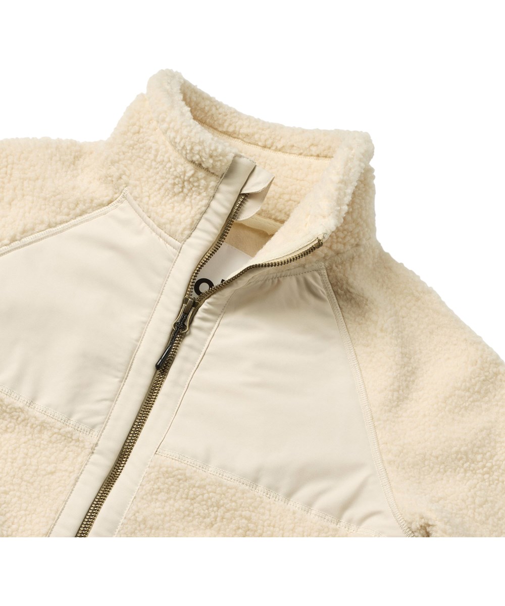 Usher - Summer Sand - Råhvid fleecejakke i genanvendt polyester med frontlommer og slidstærke detaljer til børn