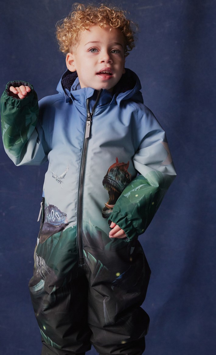 Polar - Amazing Dino - Blå og grøn flyverdragt til en kold vinter i genanvendt polyester