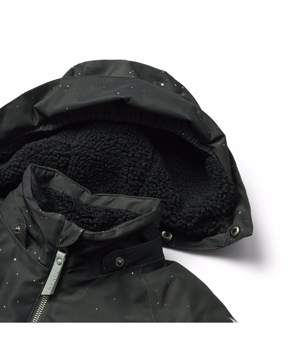 Polar - On The Moon - Vandafvisende flyverdragt med et print af manden på månen fremstillet i genanvendt polyester samt temperatur ned til -10°C.