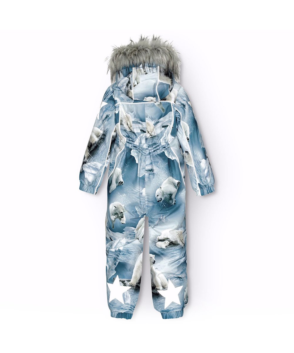 Polaris Fur - Polar Bear Joy - Flyverdragt til en kold vinter i genanvendt polyester, med et print af legende isbjørne imellem isflager i blå nuancer. Dragten er vind og vandtæt og foret med 3M™ Thinsulate™