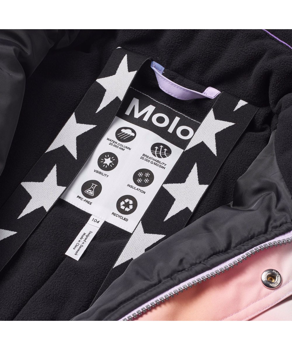 Polaris - Wavy Rainbow - Flyverdragt til en kold vinter i genanvendt polyester, med et multifarvet bøljet grafitti print. Dragten er vind og vandtæt og foret med 3M™ Thinsulate™