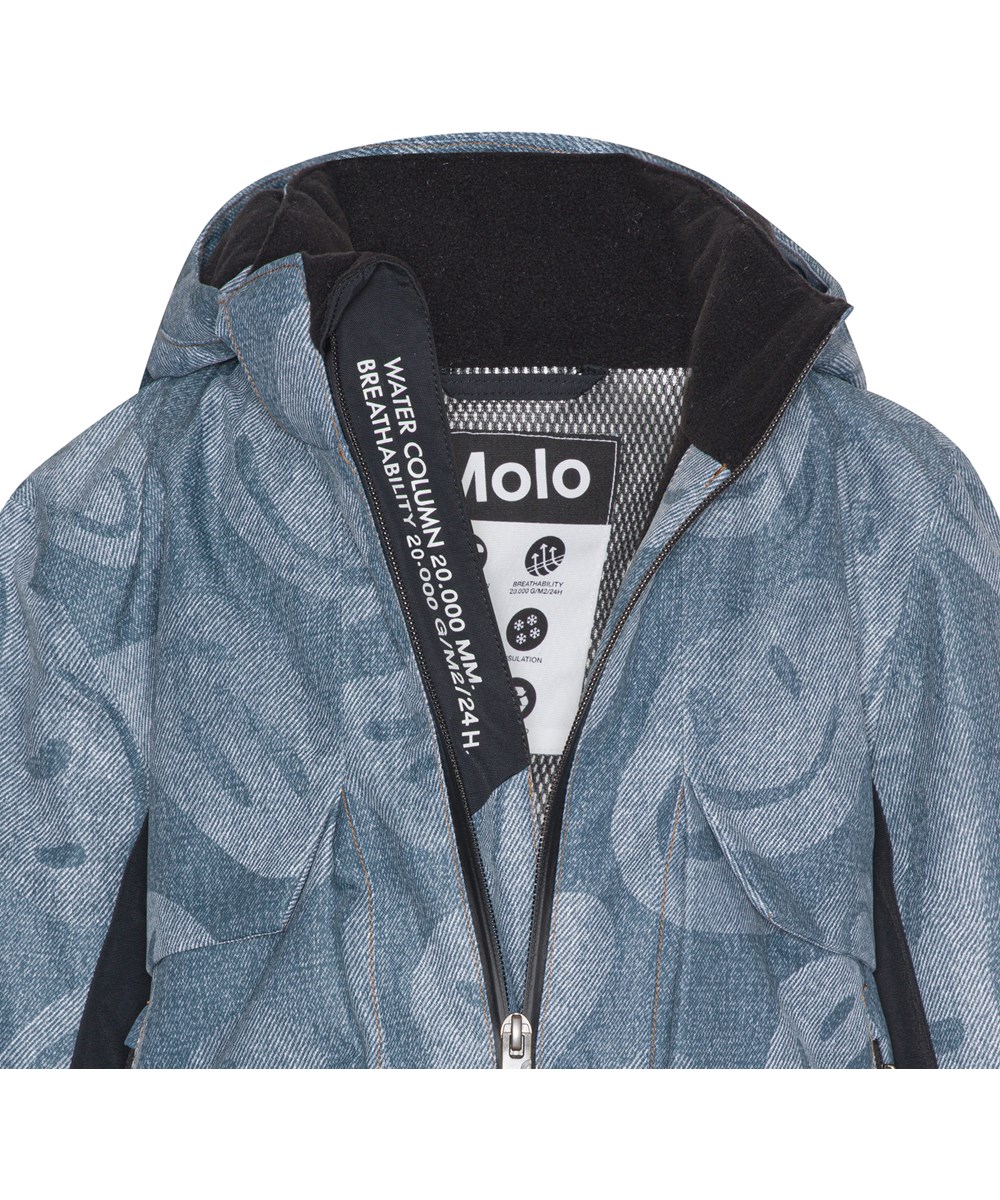 Alpine - Denim Swirley - Recycled skijakke i blå med print af ansigter