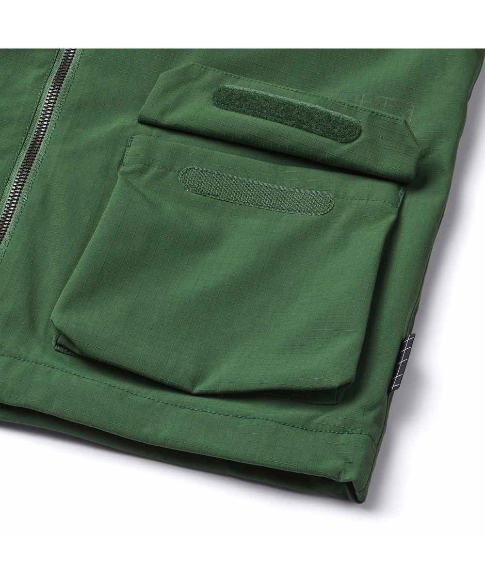 Hobson - Rubber Tree - Grøn vind- og vandtæt regnjakke til børn i genanvendt nylon med aftagelig hætte.