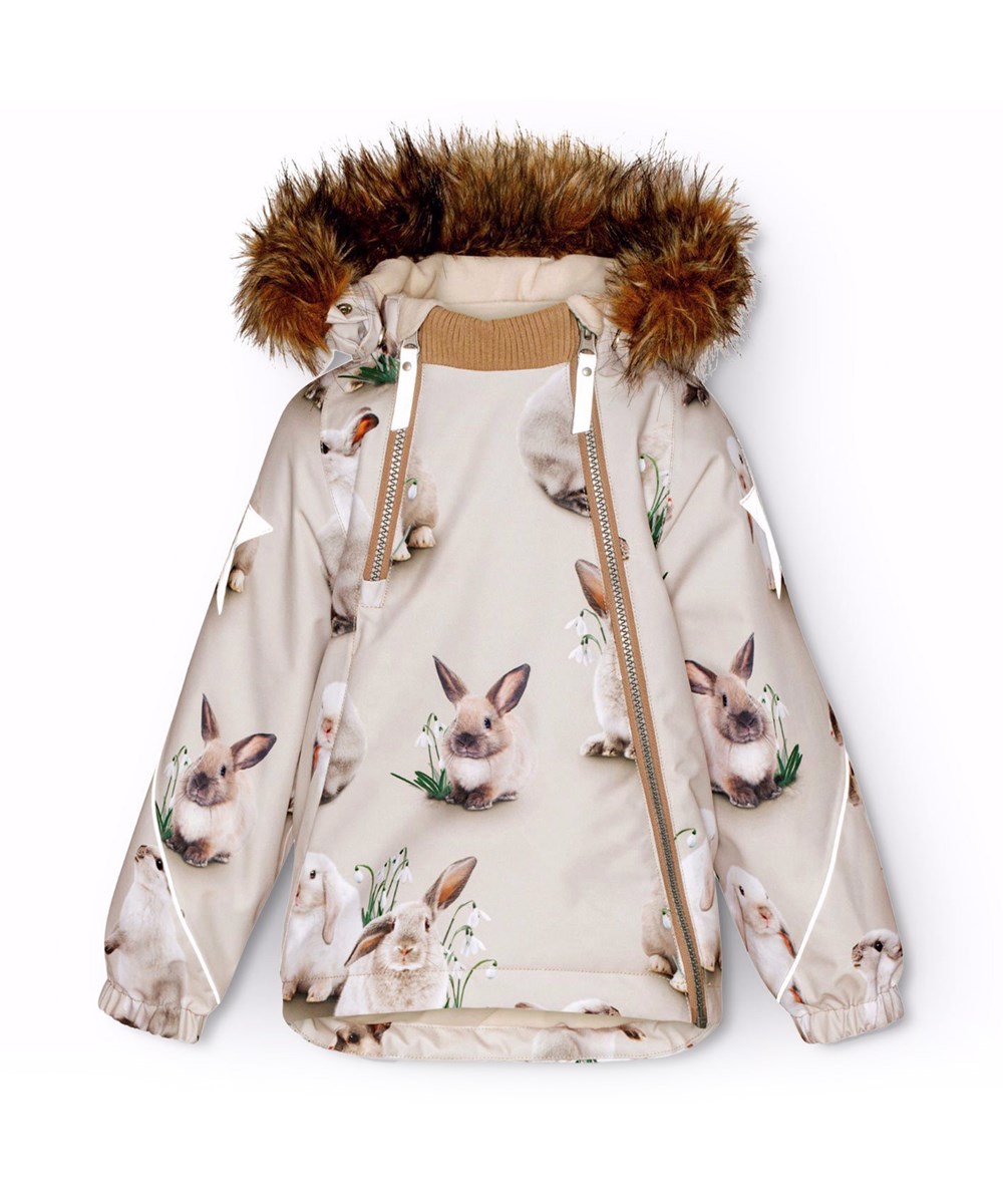 Hopla Fur - Winter Rabbits - Vind- og vandtæt vinterjakke til en kold vinter i genanvendt polyester, foret med fleece og 3M™ Thinsulate™, med et print af nuttede kaniner imellem vintergækker på en grå bagrund