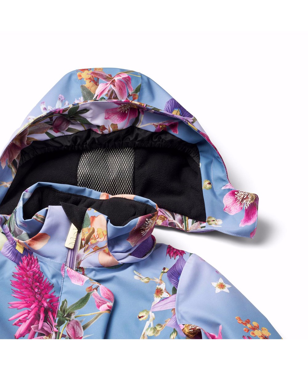 Pearson - Gradient Bloom - Den perfekte vind- og vandtætte skijakke i genanvendt polyester, foret med fleece og 3M™ Thinsulate™, i et print af smukke blomster i friske farver på en blå og lilla baggrund