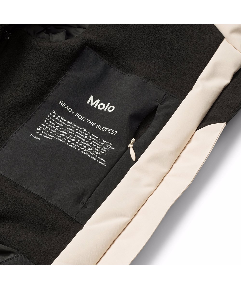 Pearson - Vanilla - Vind- og  vandtæt råhvid vinterjakke til børn i genanvendt polyester med genanvendt polyester fyld og 3M™ Thinsulate™.