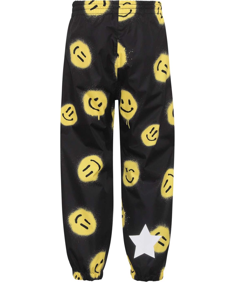 Waits - Happy! - Lette og åndbare regnbukser i sort med smiley print