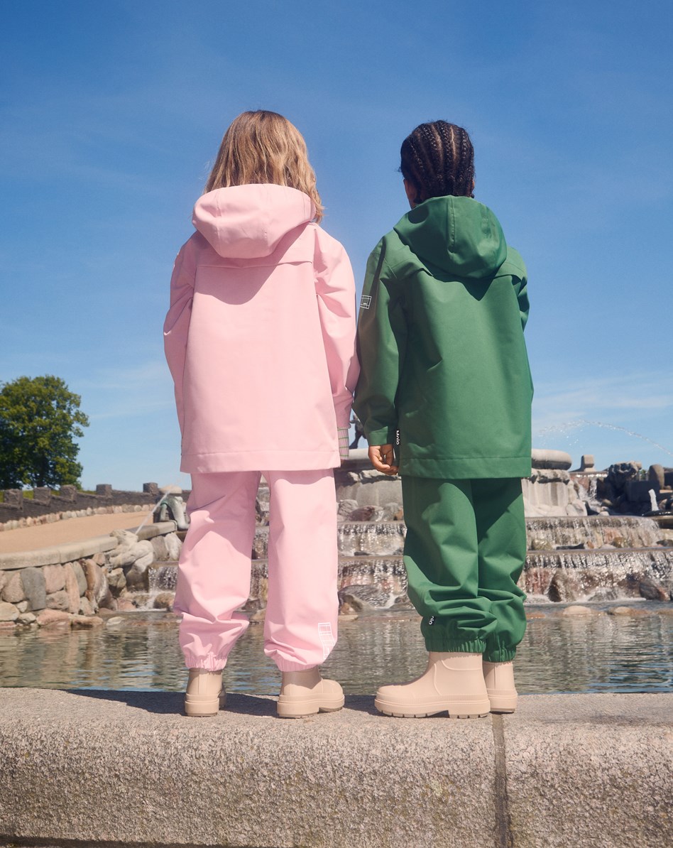 Waits - Rosequartz - Lyserøde vind- og vandtætte regnbukser til børn i slidstærkt og genanvendt polyester.