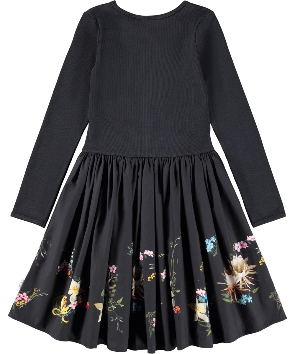 Casie - Paisley Border - Langærmet sort kjole til børn i økologisk bomuld med poplin skørt. Kjolen har et blomsterprint