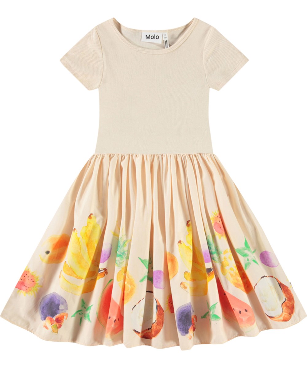Cissa - Dancing Fruits - Beige kortærmet kjole til børn i økologisk bomuld med tætsiddende ribbet jerseytop og poplin skørt.