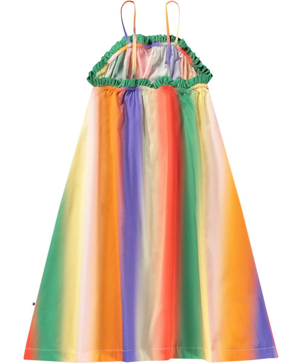Connie - Big Rainbow - Regnbuefarvet løs kjole til børn i økologisk bomuld med tynde stropper og flæsekant.