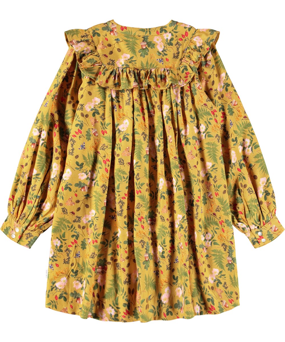 Constance - Foraging - Langærmet gul kjole med flæsedetaljer og print af blade, blomster og nødder til børn. 