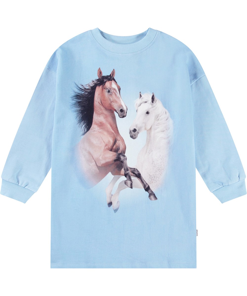 Cyrella - Bleu Horses - Lyseblå jerseykjole til børn i blødt økologisk bomuld med ribkanter ved ærmer og hals.