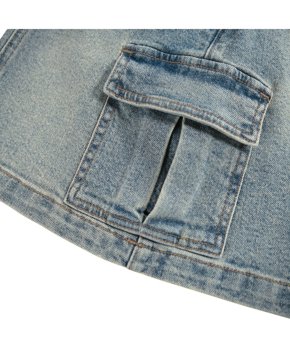 Belli - Vintage Denim - Denim nederdel i økologisk bomuld med cargolommer på siden til børn. 