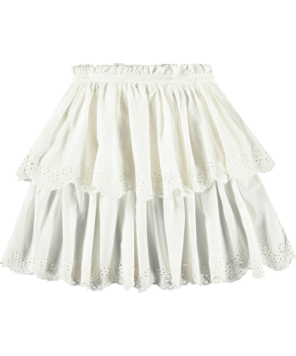Brianna - Crisp White - Hvid nederdel i økologisk bomuld til børn. Nederdelen er mellemlang og har to skørter i forskellige længder med broderi anglaise langs kanten.