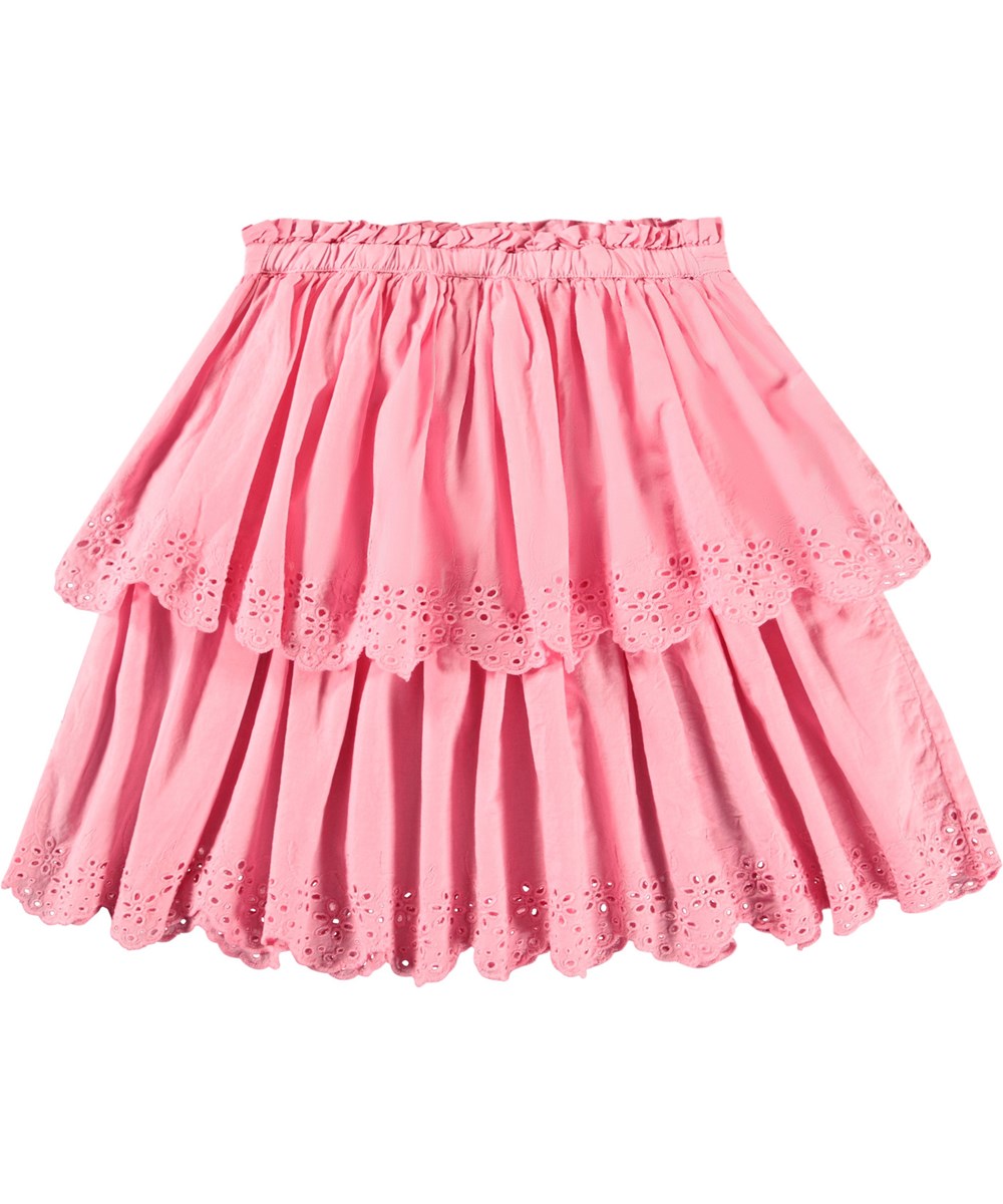 Brianna - Pink Lemonade - Pink nederdel i økologisk bomuld til børn. Nederdelen er mellemlang og har to skørter i forskellige længder med broderi anglaise langs kanten.
