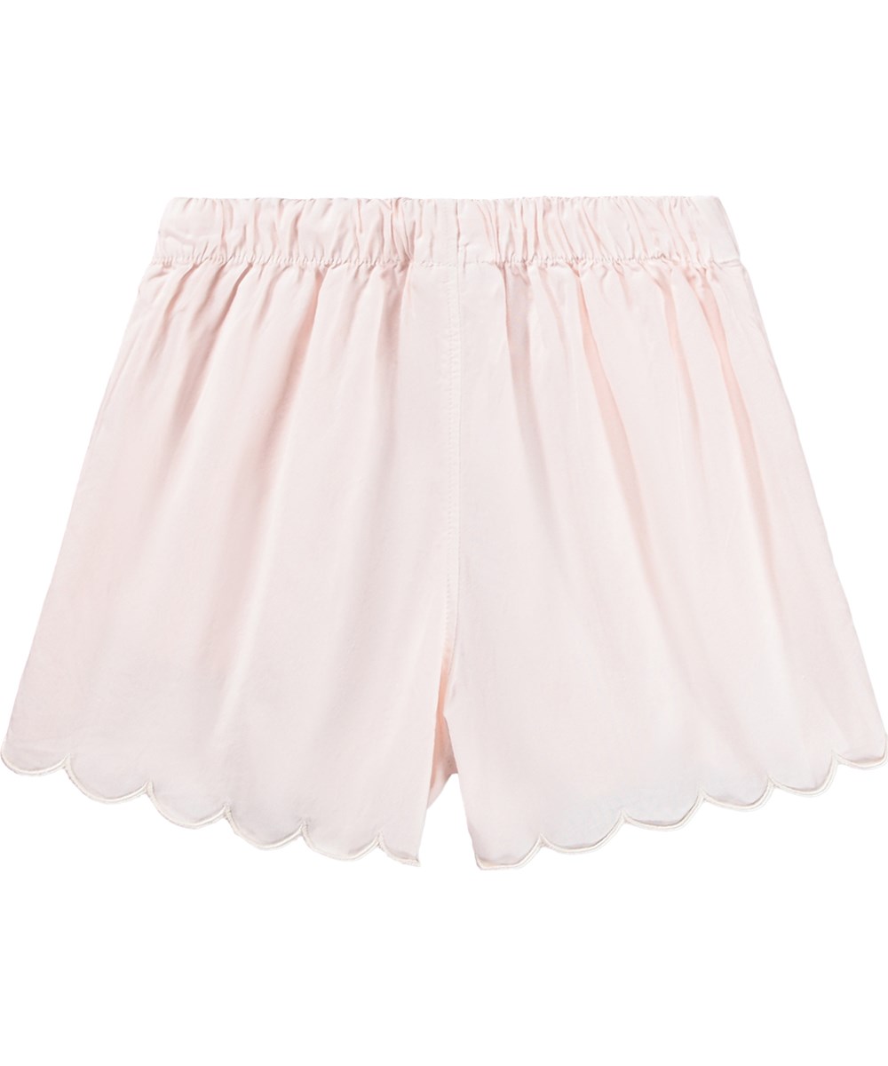 Addie - Cloud Pink - Lyserøde, shorts i økologisk bomuld med bølgede kanter til børn.