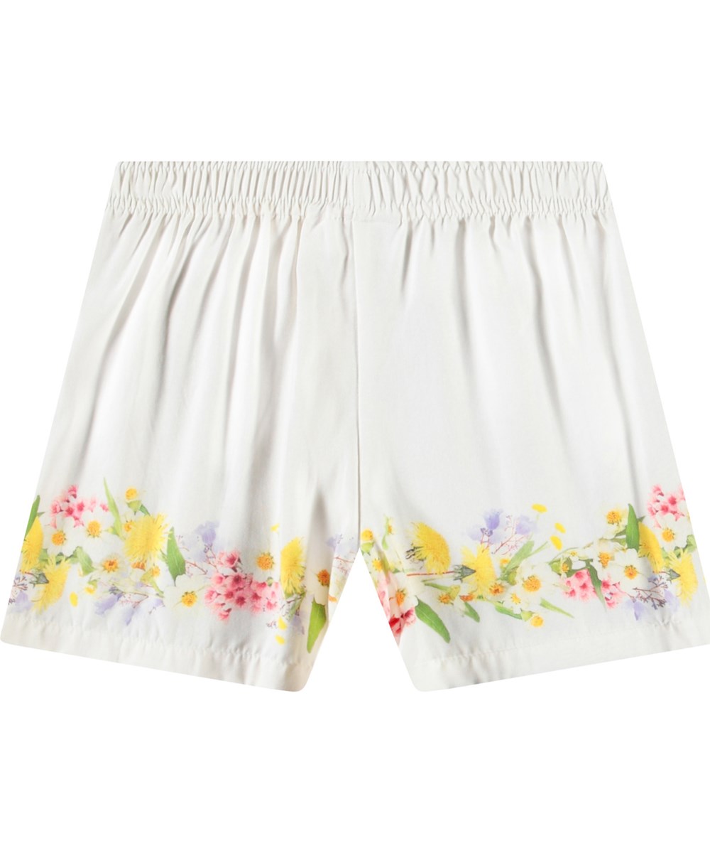Adore - Picturesque - Korte løse shorts i viskose til børn. Hvid med blomsterprint.
