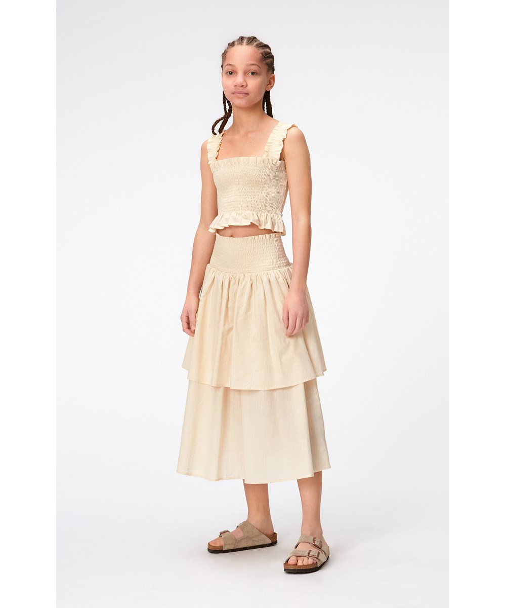 Rolfia - Summer Sand - Beige kort smock top i blødt bomulds materiale.