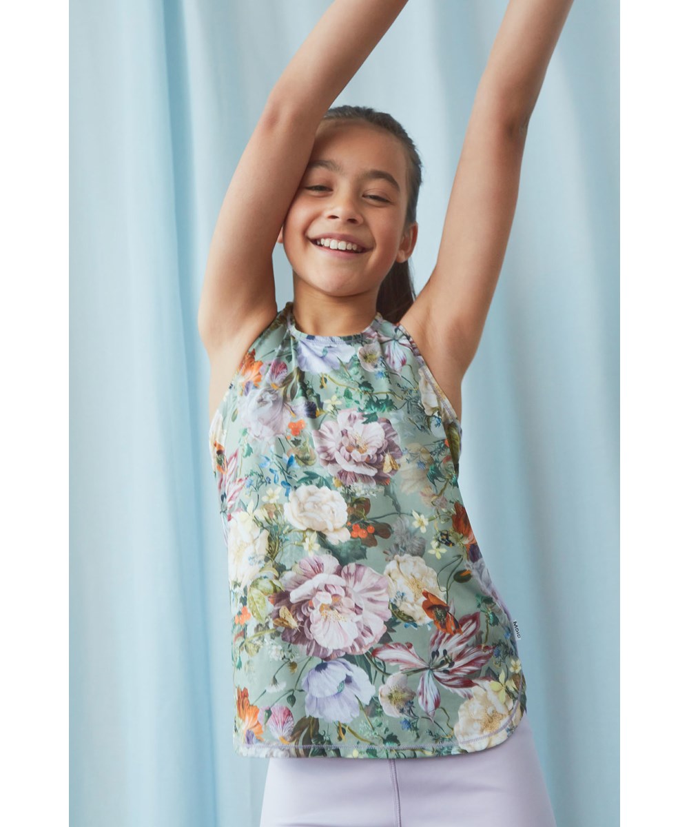 Oriana - Green Botanic - sportstop i lysegrøn med blomster print