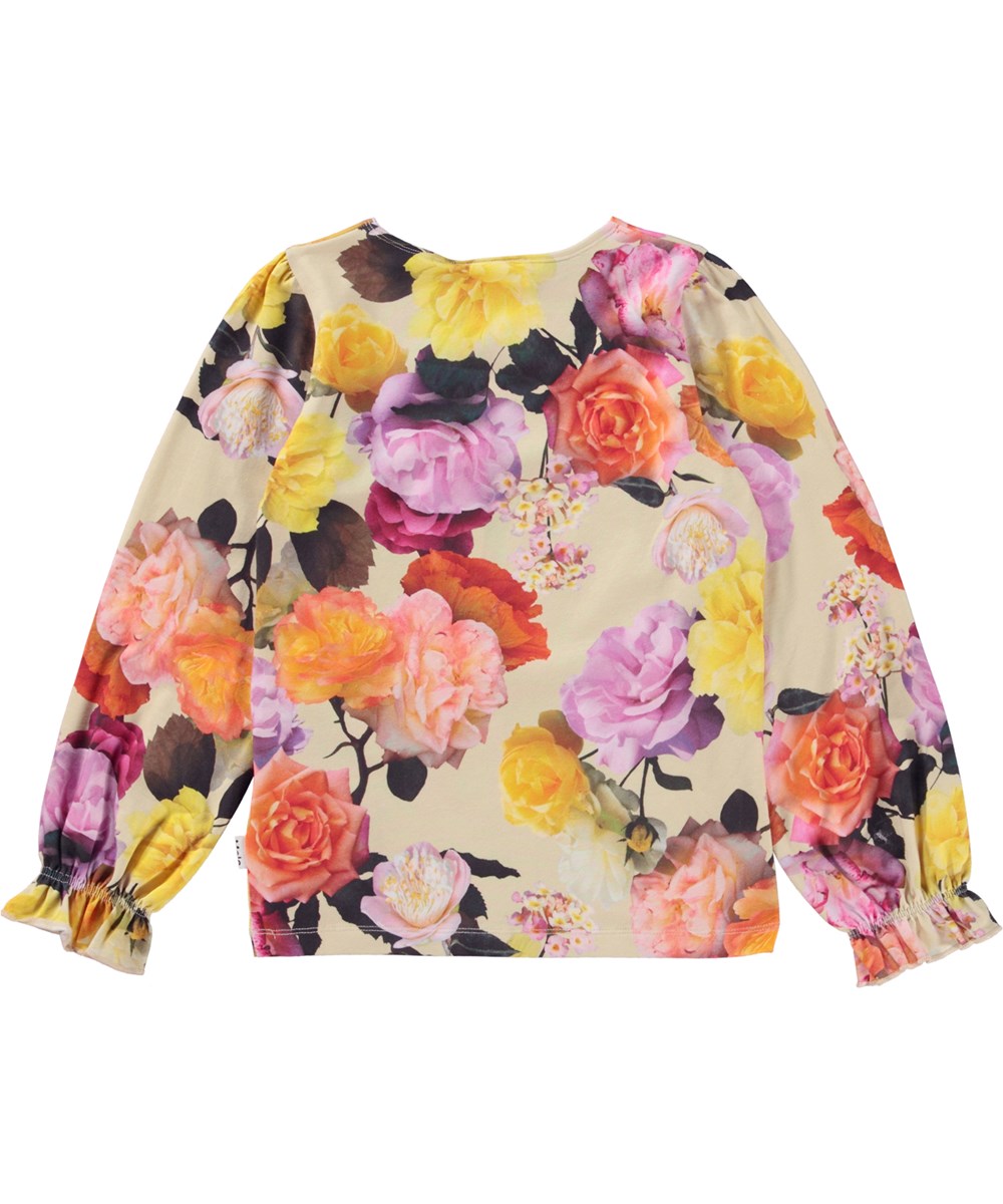 Raina - Rose Garden - Økologisk langærmet bluse med bølgende manchetter og rose print