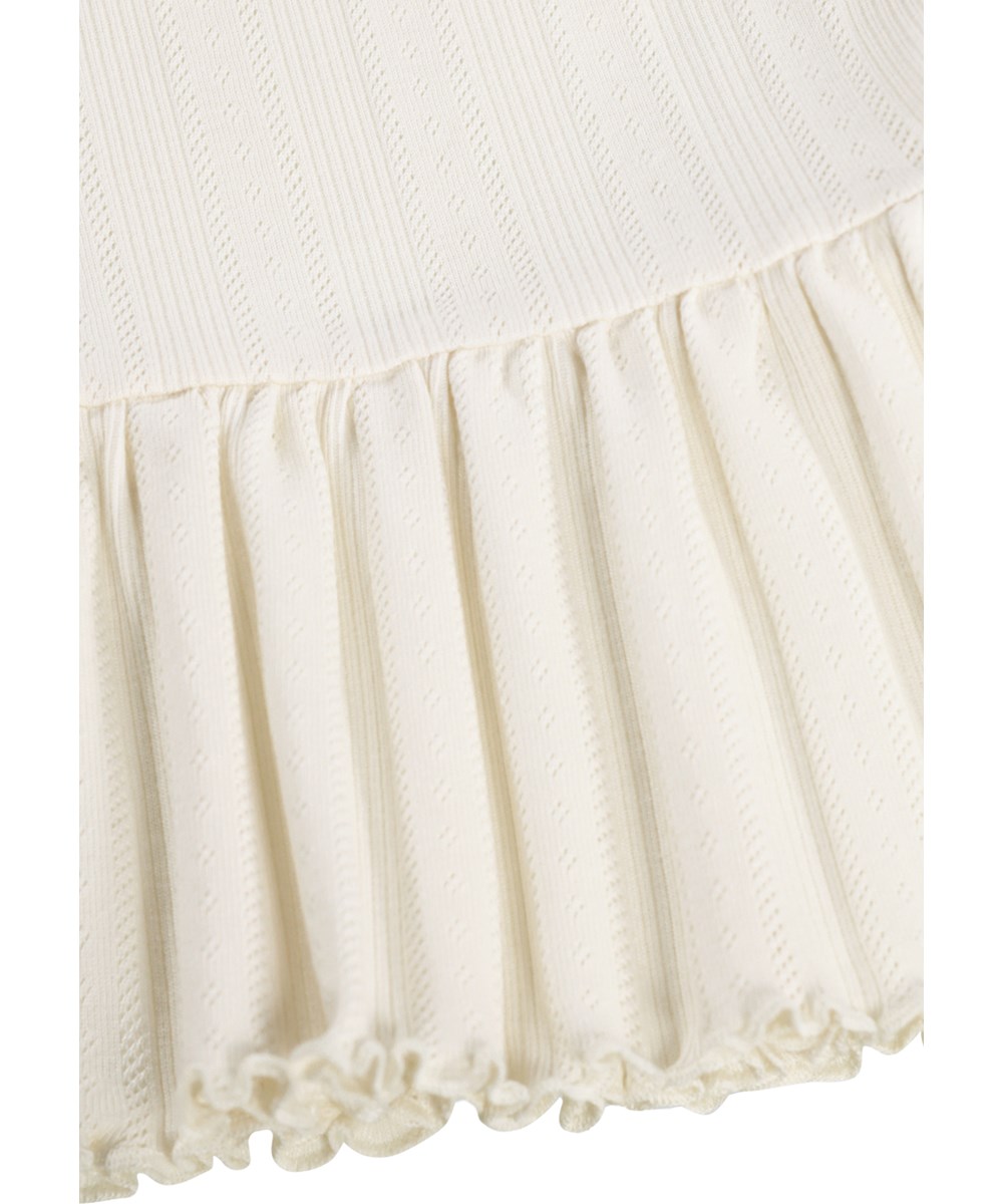 Rany - Pearled Ivory - Råhvid, ærmeløs top i økologisk bomuld med smalle stropper til børn