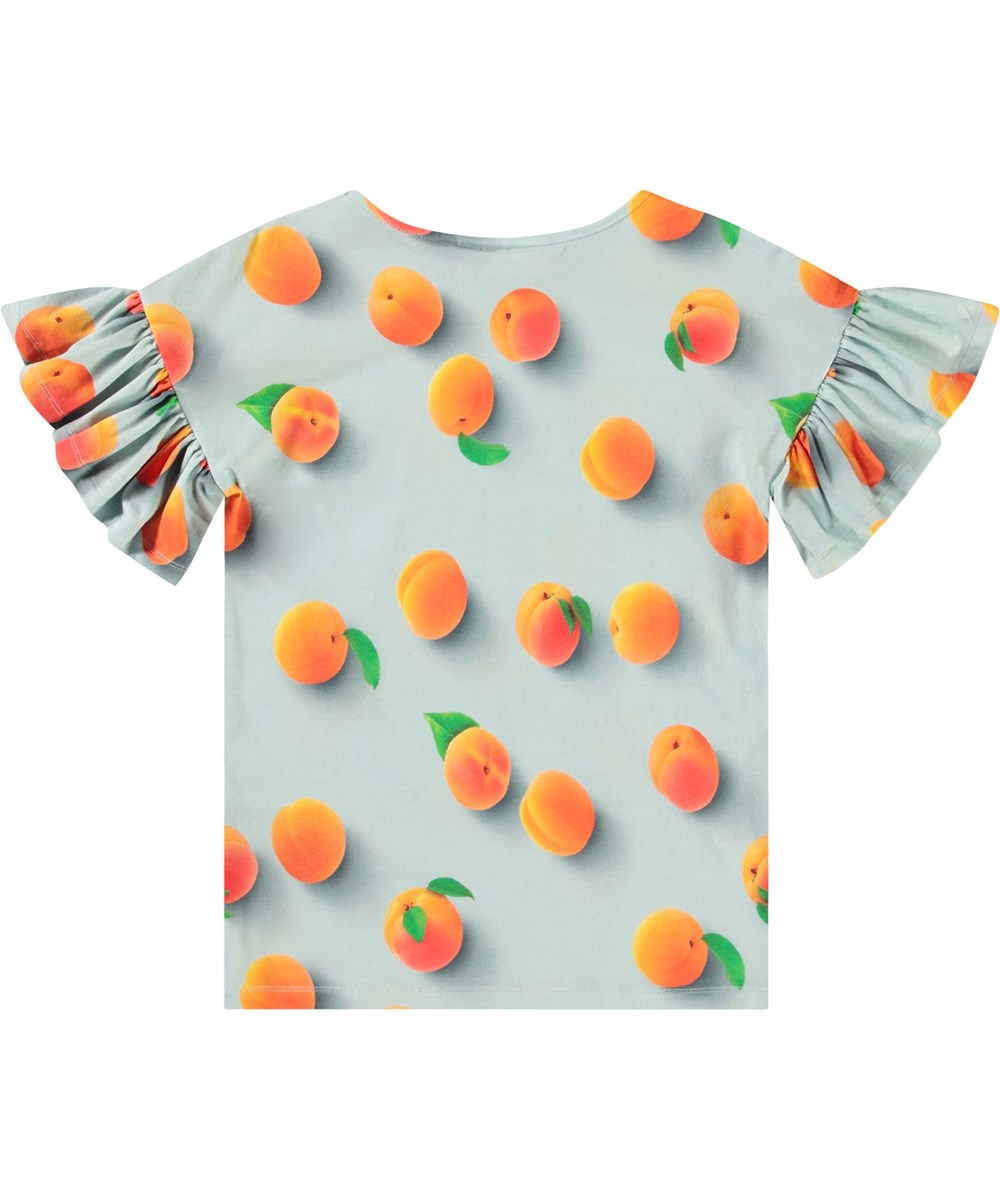 Rayah - Fresh Apricots - Lyseblå økologisk bomulds t-shirt til børn med rund hals og flæseærmer.