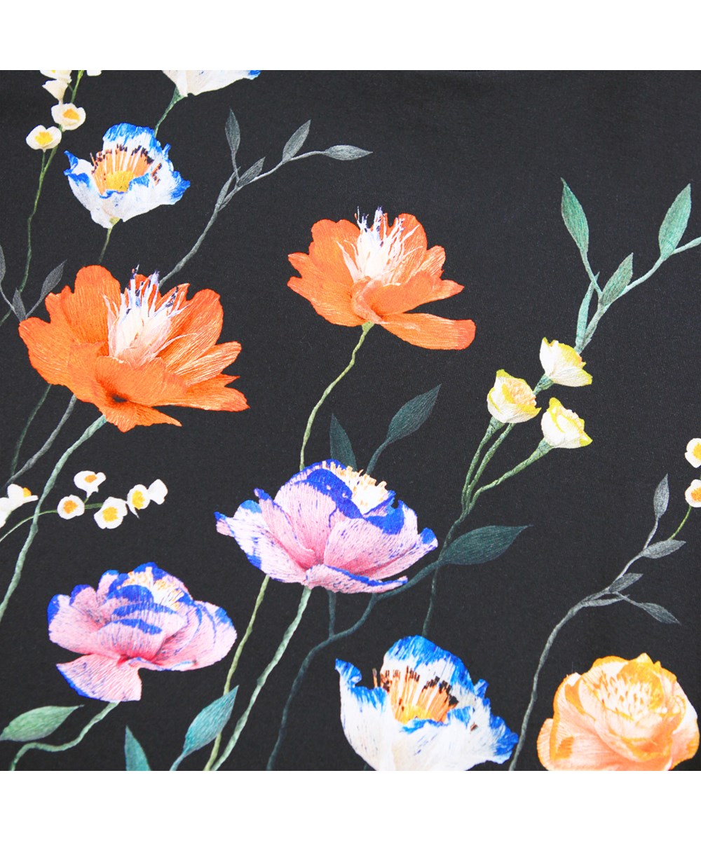 Reniza - Flower Picking - Sort langærmet bluse til børn i blødt økologisk bomuld med ribkant i ærmer og hals med print af farverige papirblomster.