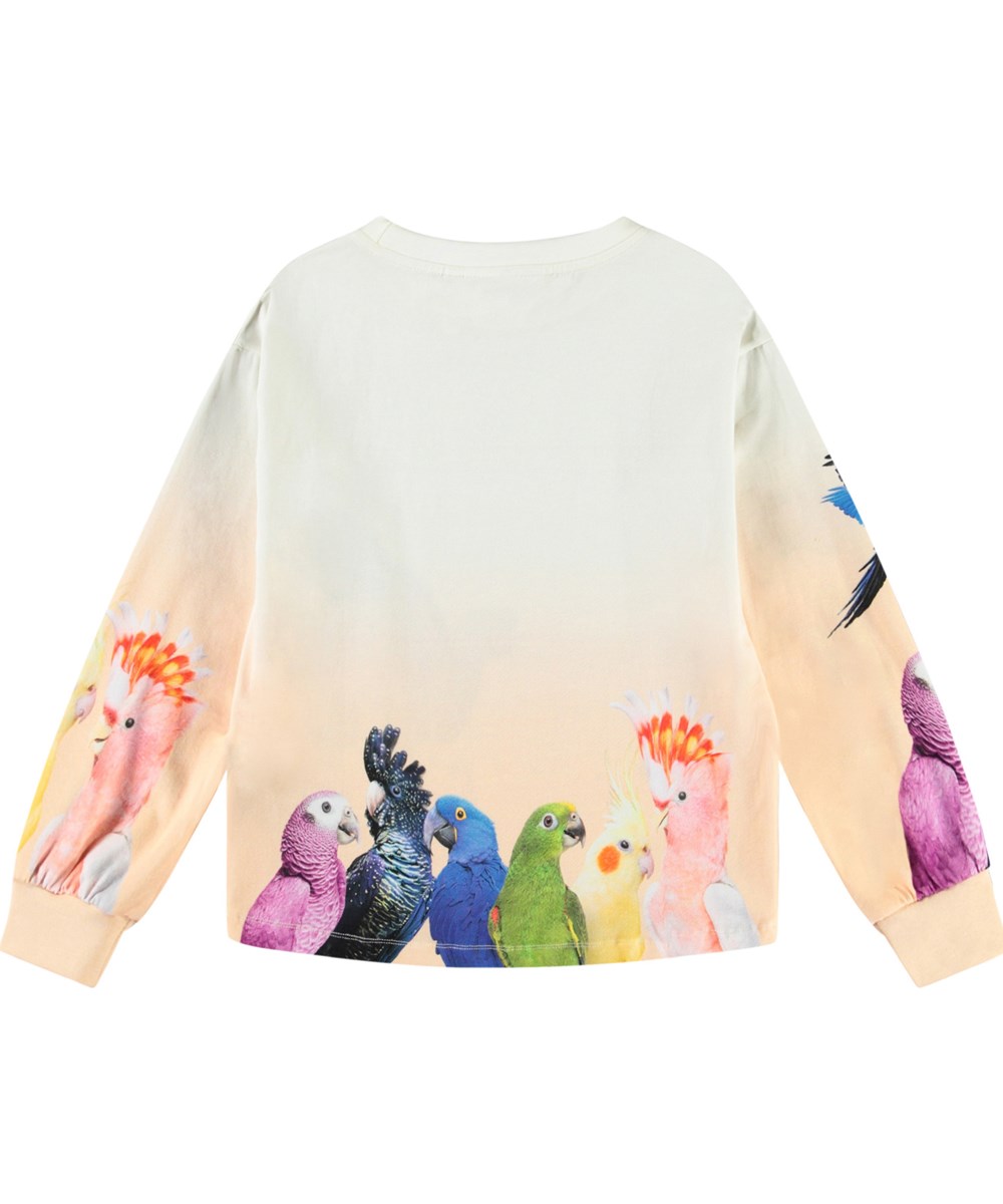 Reniza - Group Of Parrots - Råhvid og lys orange langærmet bluse med print til børn i blødt økologisk bomuld med ribkant i ærmer og hals.