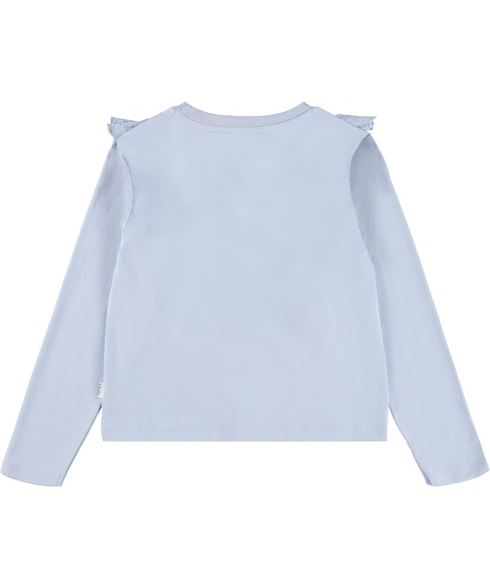 Rheta - Blue Moon - Lyseblå, langærmet bluse til børn i økologisk bomuld med rund hals og ribkant samt en flæsekant i broderi anglaise.
