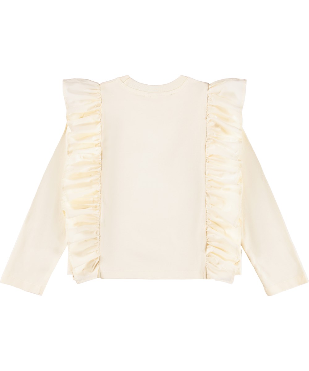 Rith - Buttercream - Råhvid langærmet bluse til børn i økologisk bomuld med rund hals og flæse.