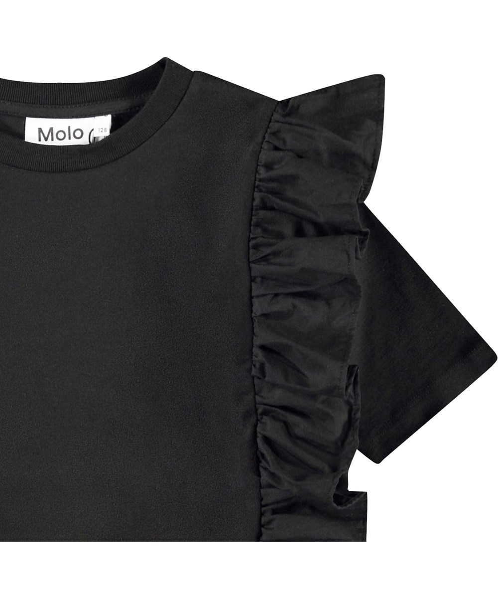 Riva - Black - Sort t-shirt til børn i blødt økologisk bomuld med ribkant i hals og flæsekant.