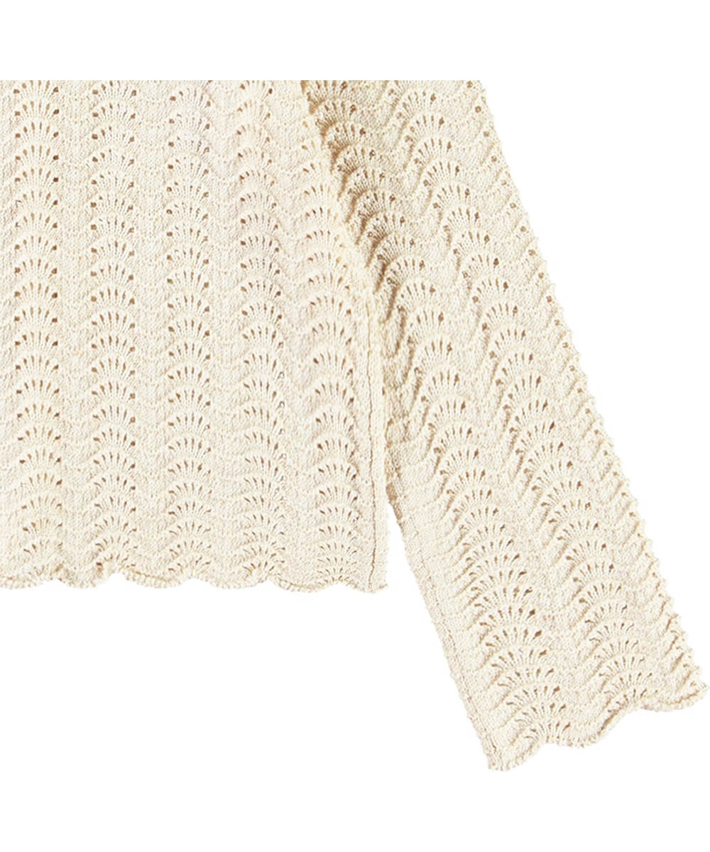 Gigi - Sand Melange - Råhvid strikket cardigan til børn i blødt økologisk bomuld med flot hulmønster.