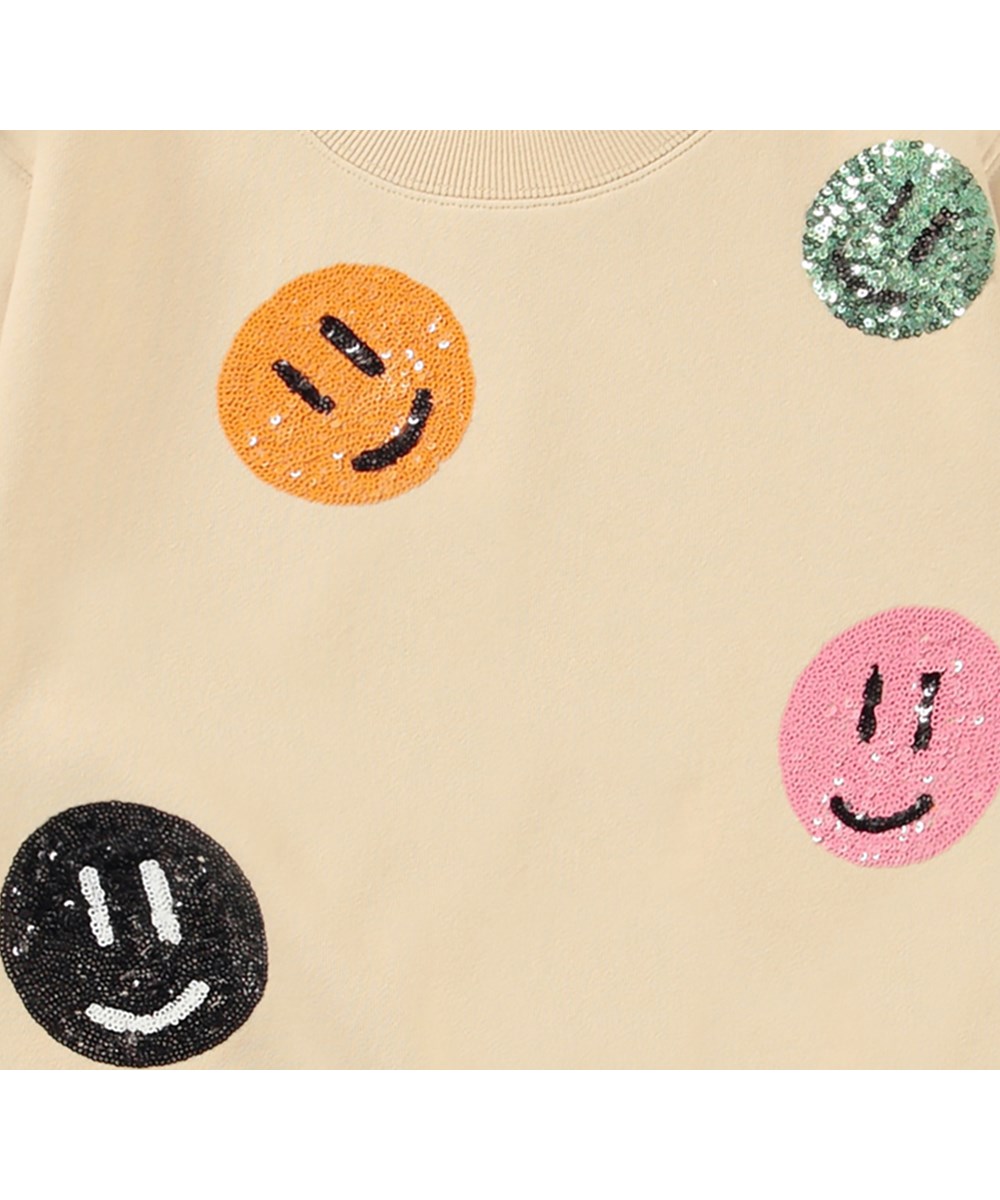 Marge - Starlight - Lysegul sweatshirt med paliet smileyer