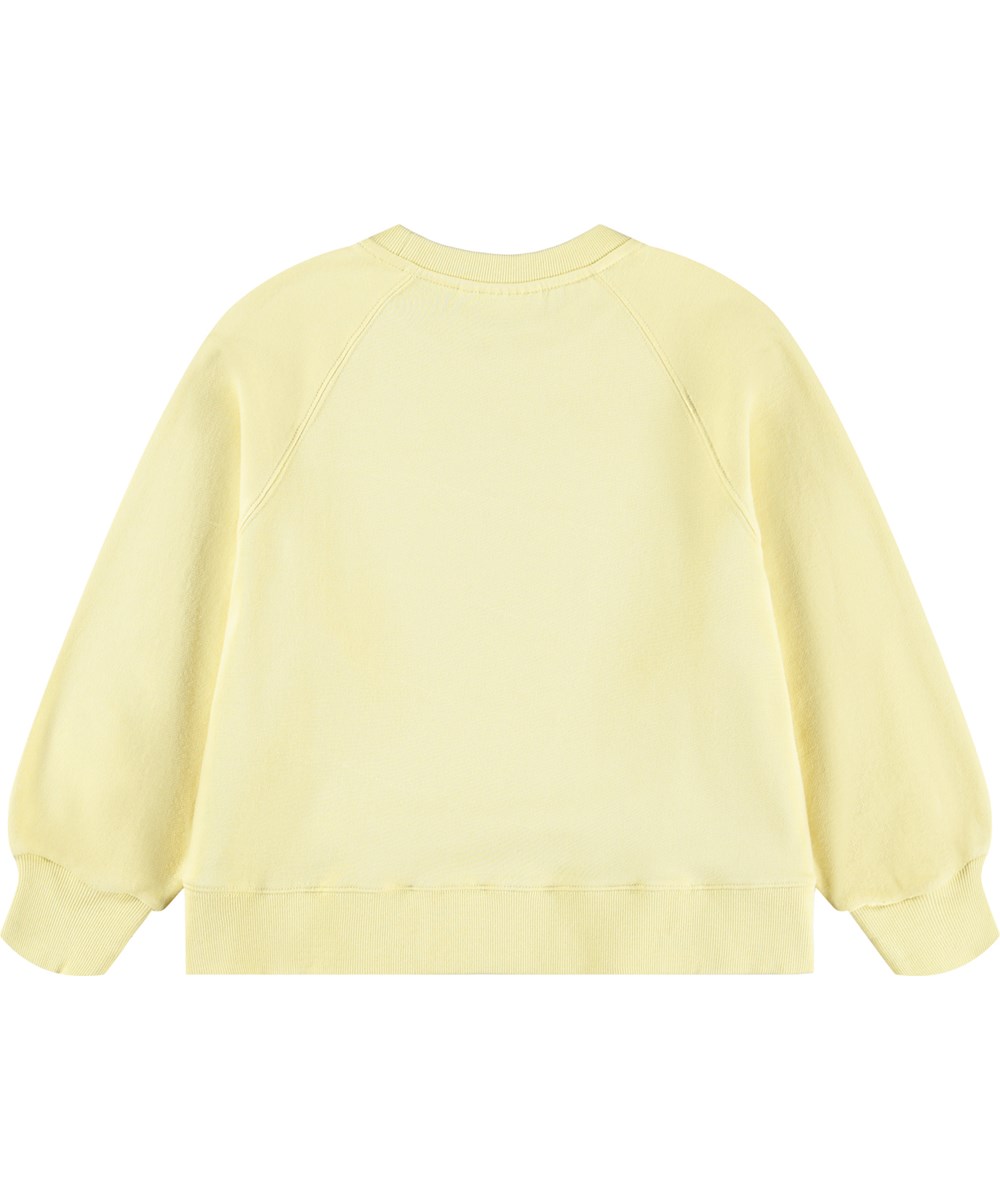 Marilee - Mellow Yellow - Lysegul sweatshirt til børn i økologisk bomuld med paillet-regnbue