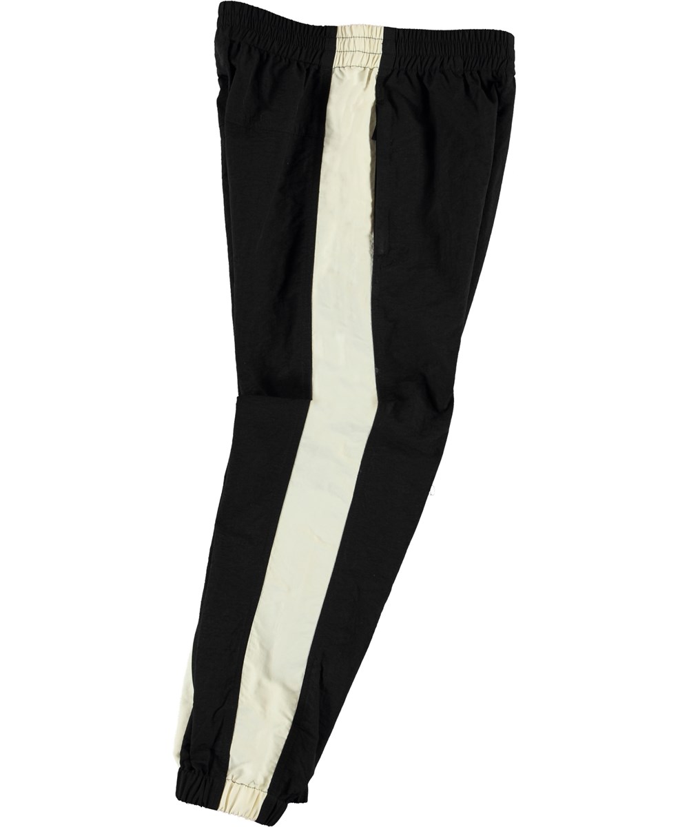 Acis - Black - Svarta trackpants med vit rand