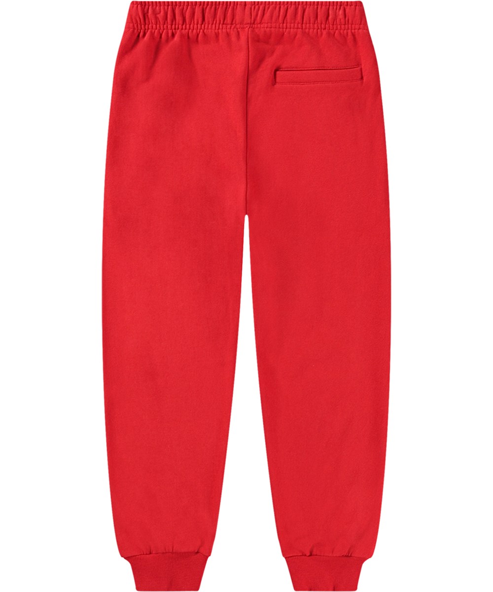 Adani - Adrenaline Rush - Röda ekologiska bomulls sweatpants med "Play" tryck och ribbade muddar.