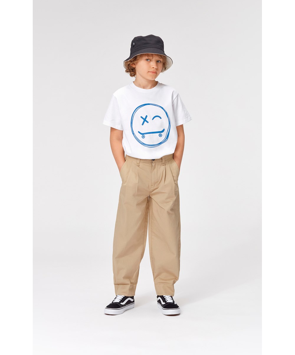 Ari - Gravel - Baggy chinos i beige. 