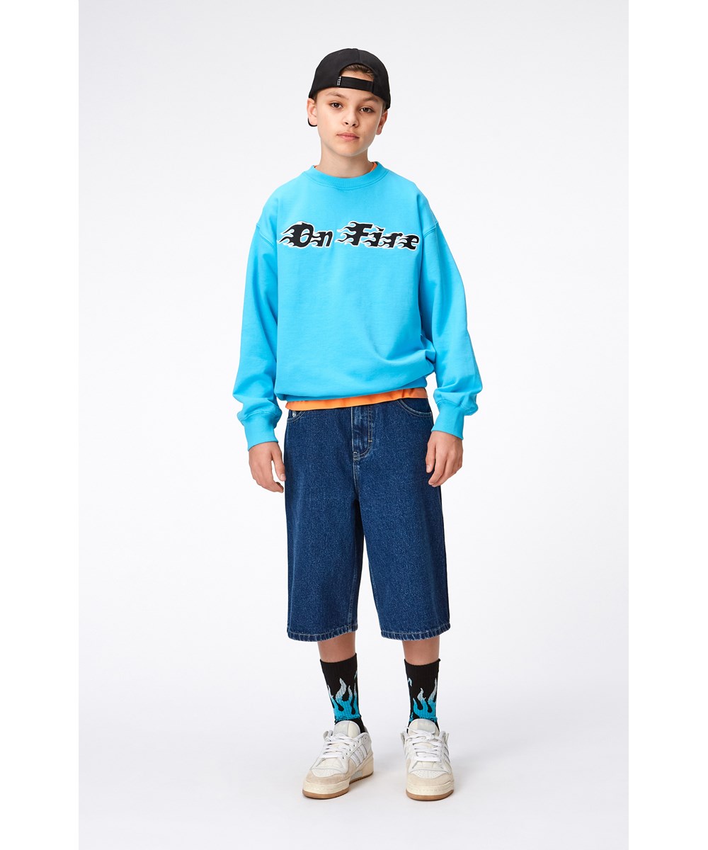 Alpha - Blue Denim - Mörkblå jeansshorts.