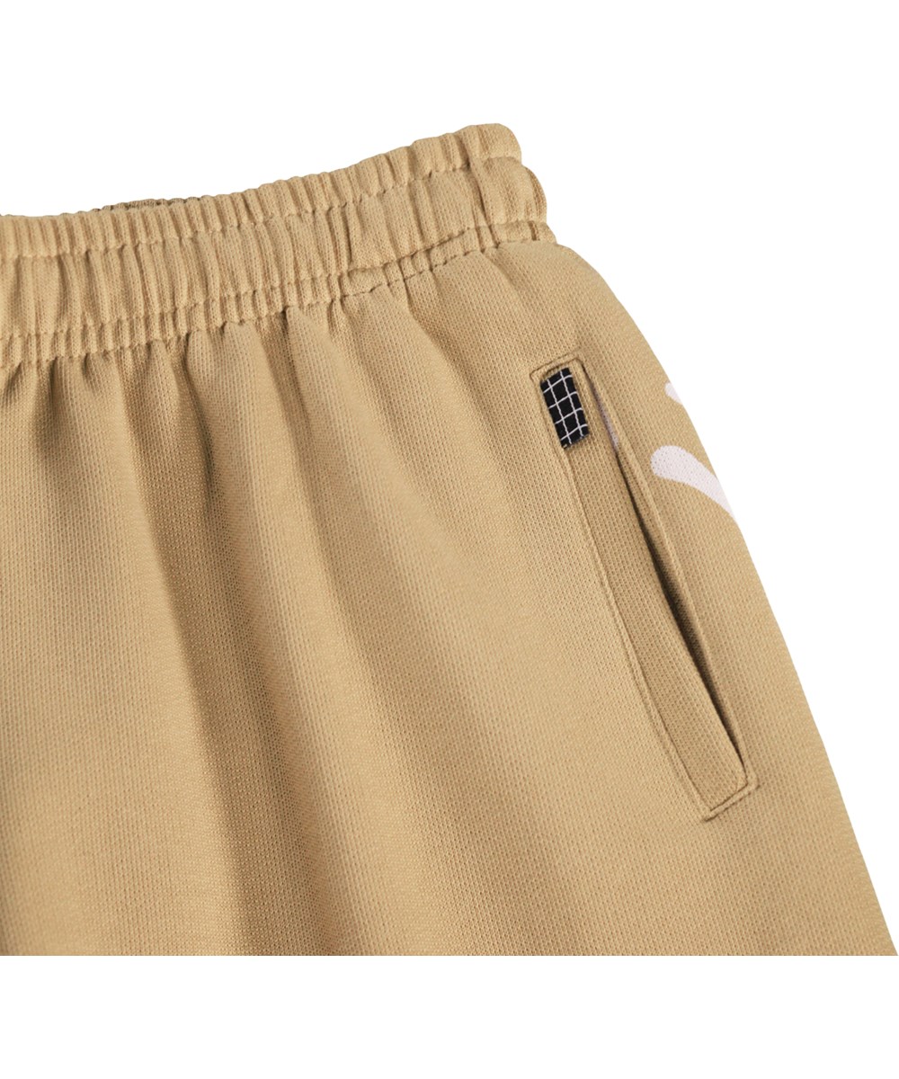 Amil - Desert Smiles - Beiga shorts för barn i ekologisk bomullsjersey med mönster